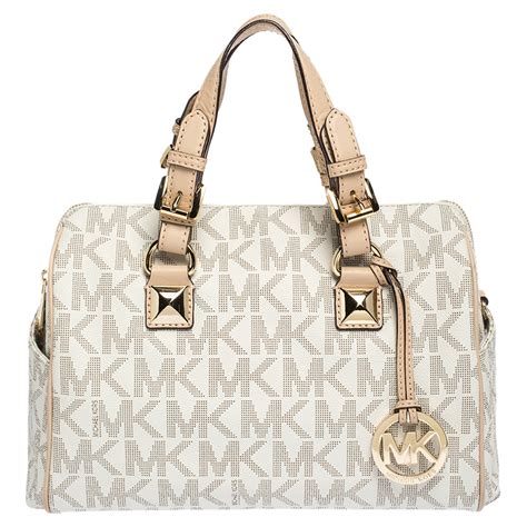 beige michael kors handbags|Michael Kors fold over purse.